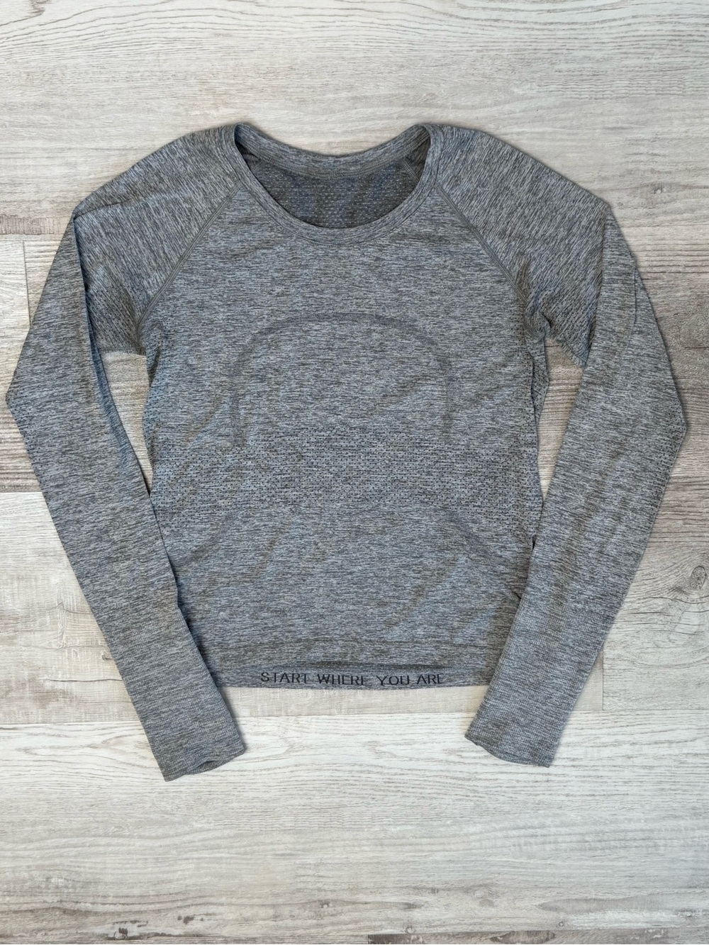Lululemon Swiftly Tech Long Sleeve 2.0 Women’s size 6
Slate / White